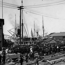 Ship leaving Seattle waterfront for Alaska during gold rush